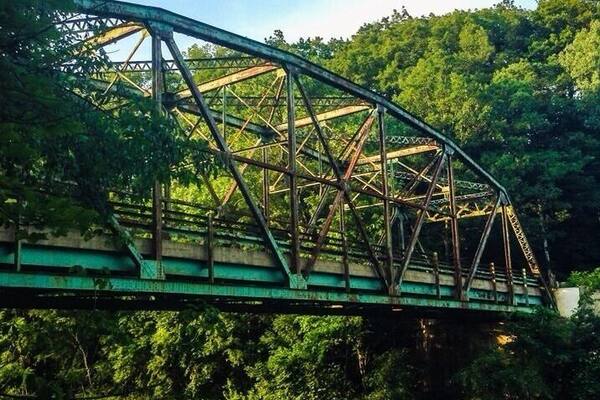 A bridge in Miller's Falls lot by a beautiful sunset.