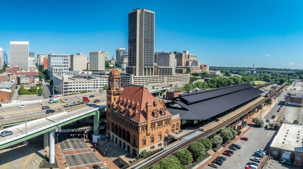 Aerial view of downtown Richmond with skyscrapers, historic Main Street train station