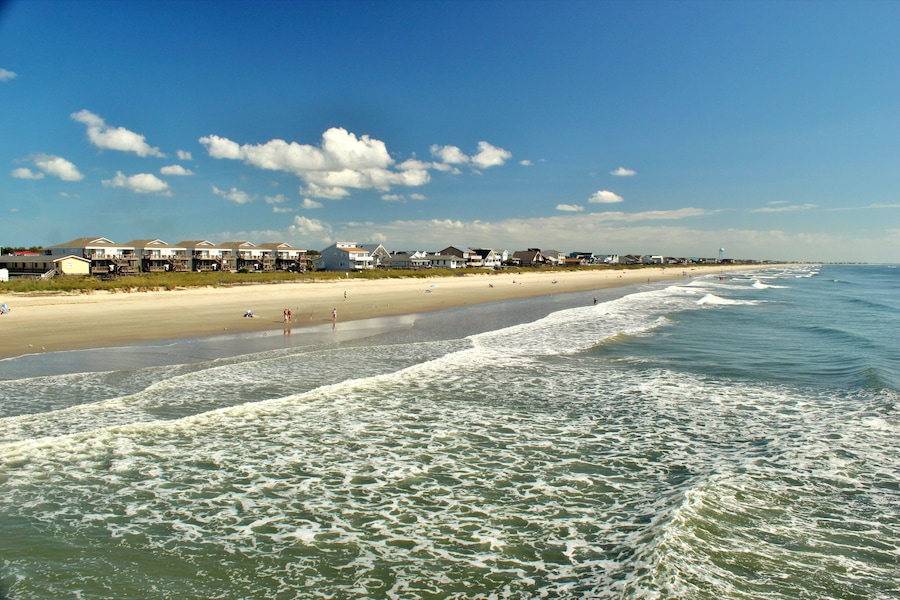 Views of the Holden's Beach in NC with ocean front properties in the background