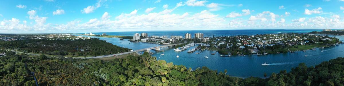 Aerial panorama of colorful turquoise ocean water
in Jupiter, Florida. USA