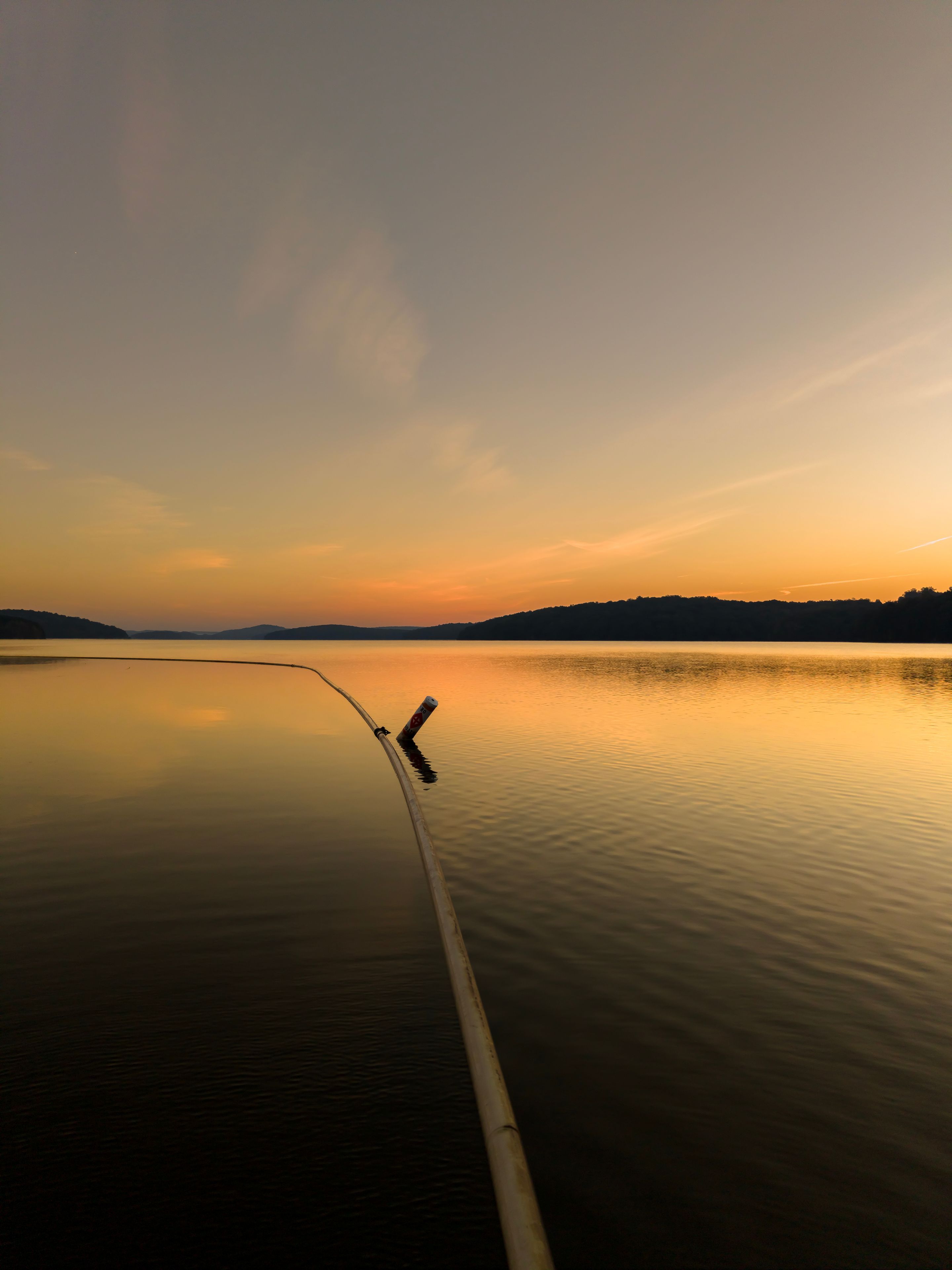 No Boats Buoy on Calm Lake Water at Sunrise, Badin Lake NC
