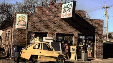 This 3 wheel car passed me on the way down here, quite an oddity.