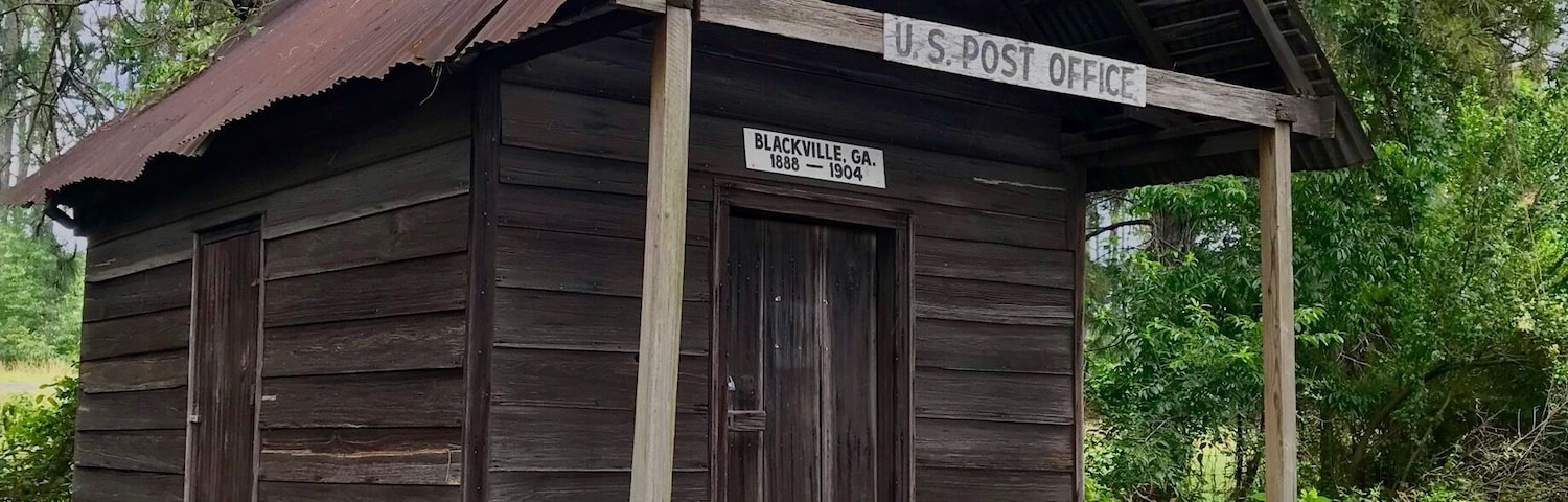 Old US Post Office for Blackville, GA next to a gas station along the interstate.