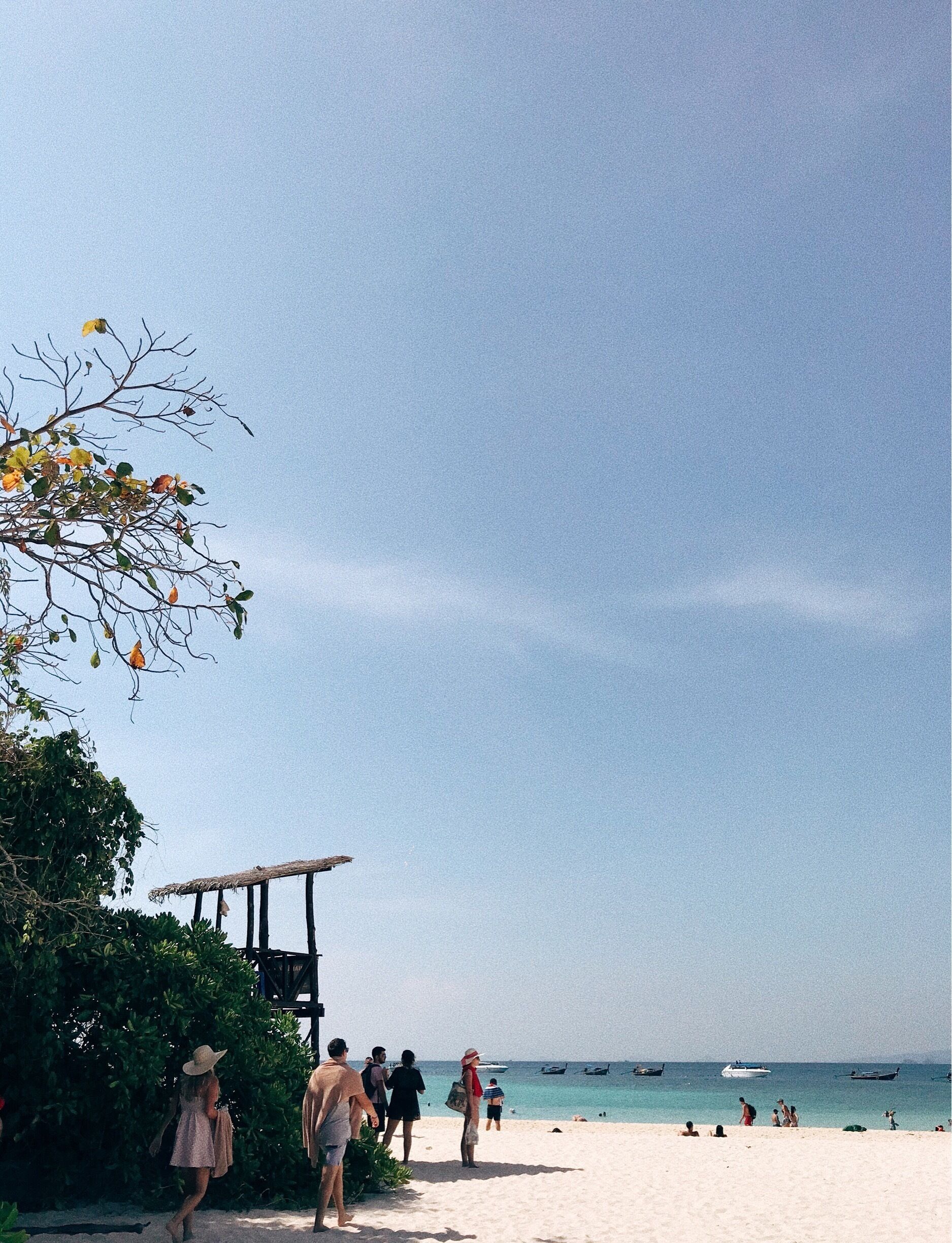 Ko Phai (Bamboo Island), Krabi. 

Tip #1: This romanticized view (thanks to pictured lovely pair) might be your on-the-wall photo as it is breathtaking. Perfect for lovebirds beach strolling. 

Tip #2: Make it rain money when you visit 7-Eleven in Thailand. Iced Mocha (All Cafe) only cost you 35 baht and all other foods are so cheap you will be out of hands carrying snacks. 

#LifeAtExpedia #Beaches