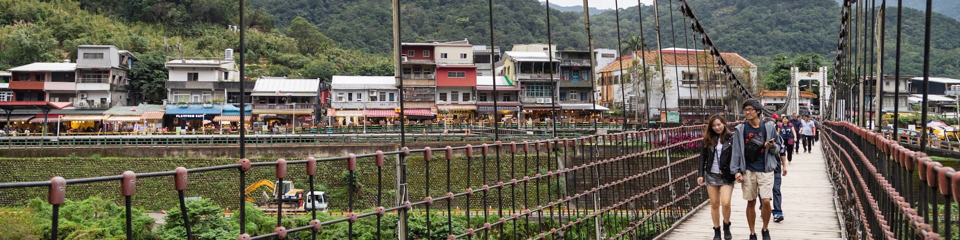 Shifen featuring a bridge, a small town or village and a river or creek