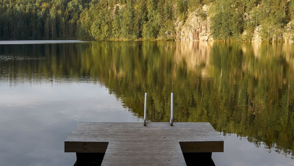 Wooden pier on a lake in Southern Konnevesi National Park, Finland