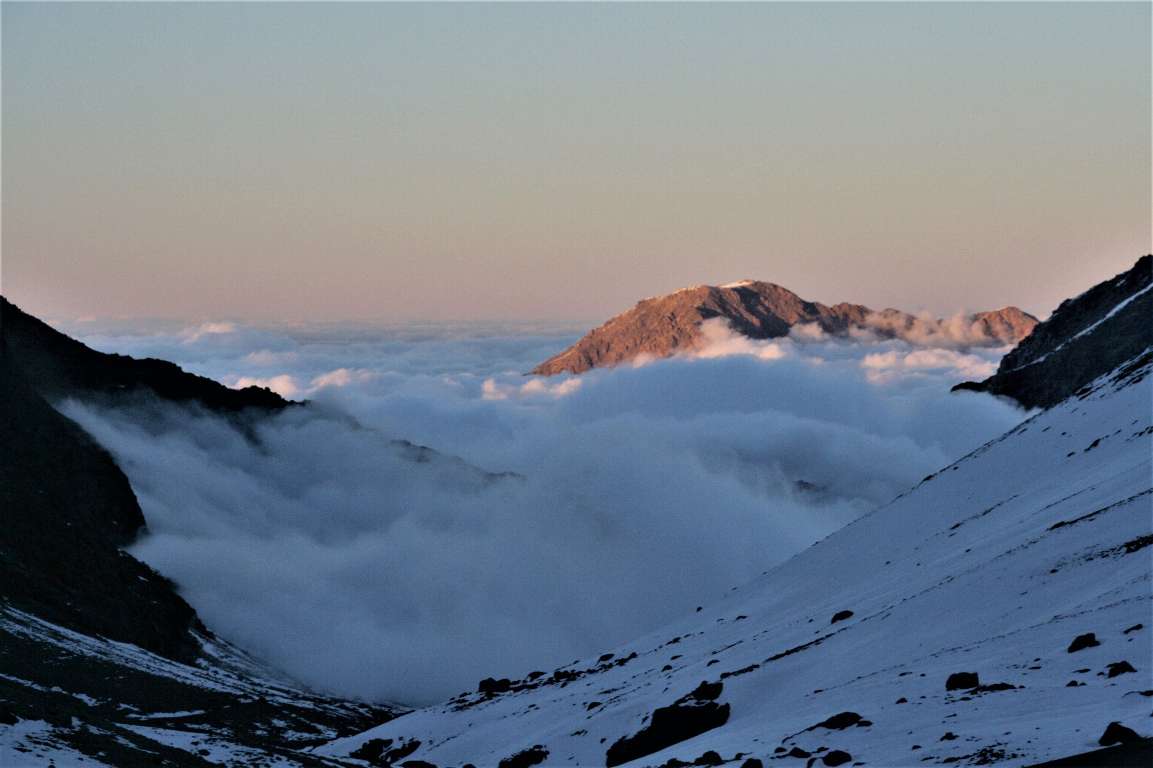 #LifeAtExpediaGroup Cloud rolling up the valley towards mount Toubkal base camp refuge. Winter ascent is a magical time to climb.