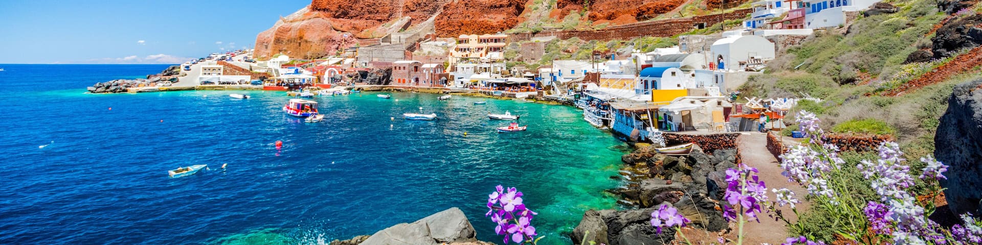The old harbor of Ammoudi under the famous village of Ia at Santorini, Greece.