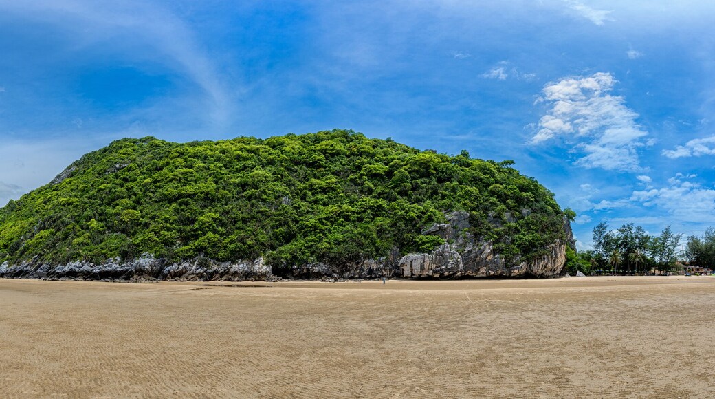 Prachuap Khiri Khan Thailand-May 16,2022 Khao Kalok Beach, Panorama image,Sandy beach and Mountain view by the sea a beautiful sky A tourist attraction that is quite like a vacation, Khao Kalok Beach