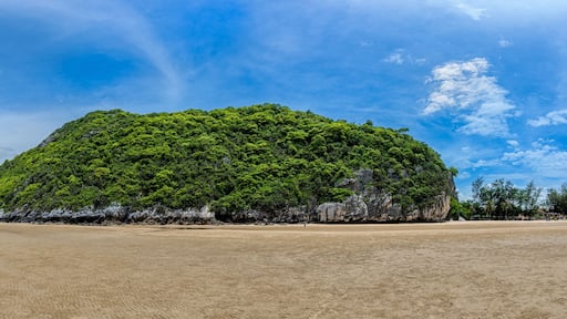 Prachuap Khiri Khan Thailand-May 16,2022 Khao Kalok Beach, Panorama image,Sandy beach and Mountain view by the sea a beautiful sky A tourist attraction that is quite like a vacation, Khao Kalok Beach