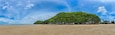 Prachuap Khiri Khan Thailand-May 16,2022 Khao Kalok Beach, Panorama image,Sandy beach and Mountain view by the sea a beautiful sky A tourist attraction that is quite like a vacation, Khao Kalok Beach