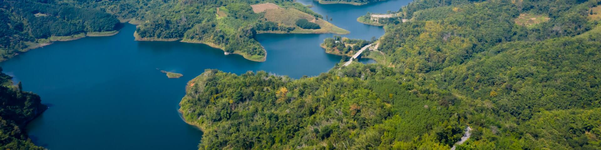 landscape aerial view mae suai dam andthe route with bridges connecting the city in valley