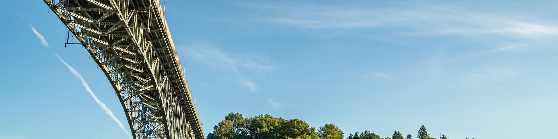 Lake Union showing a bay or harbor and a bridge