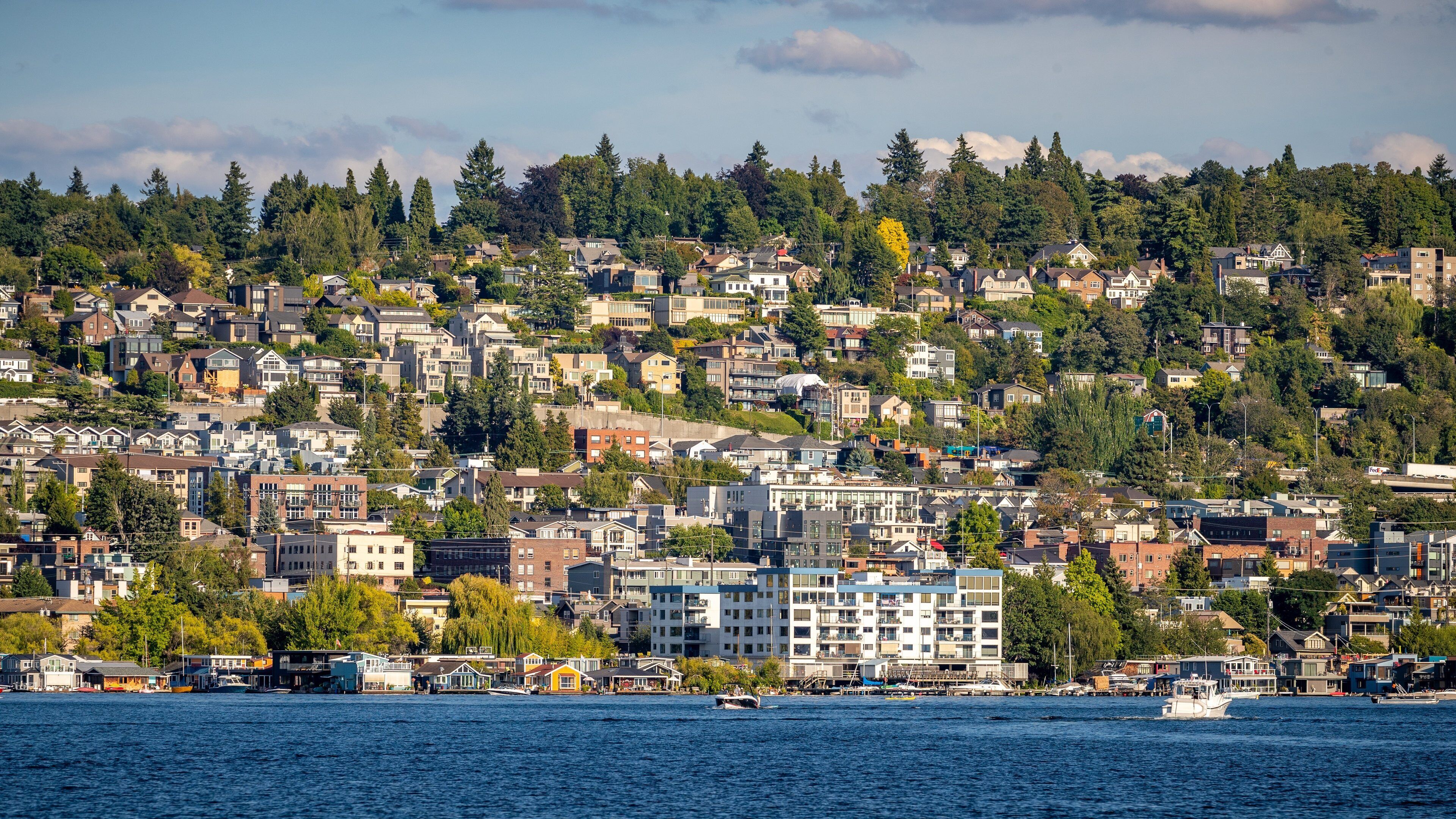 Lake Union showing a coastal town and a bay or harbor