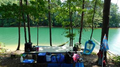 Lake Keowee is a man–made reservoir in the United States in the state of South Carolina. It was created to serve the needs of a power utility as well as public recreational purposes. One of my favorite places to go in the summer. The water really is that color.