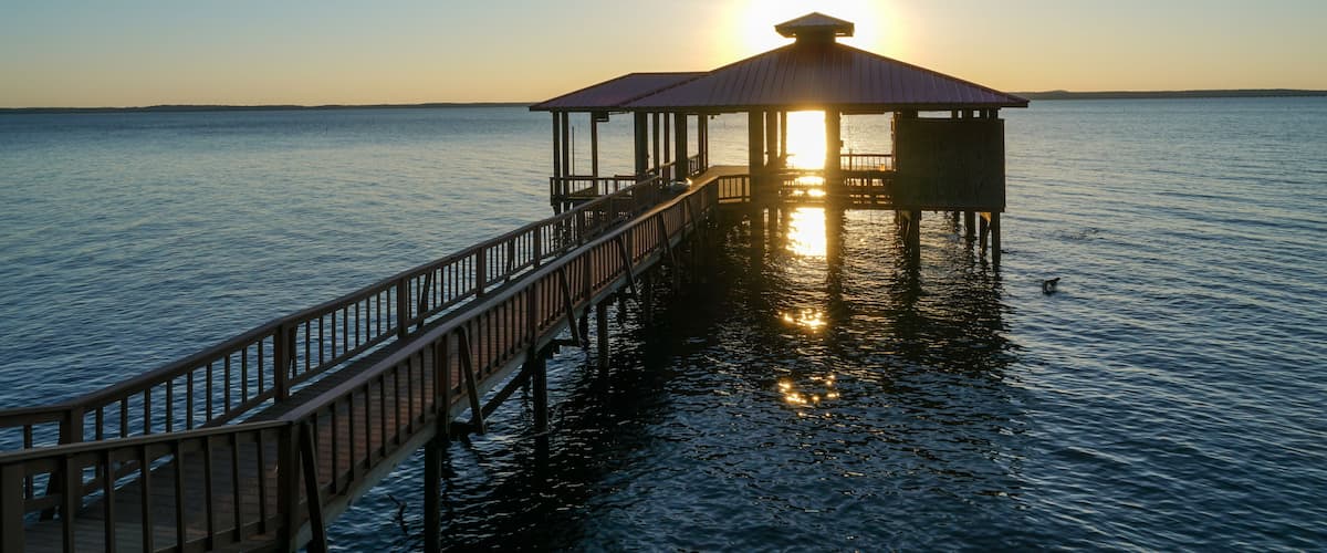 Boat dock on Toledo Bend Reservoir, Louisiana, during sunset
