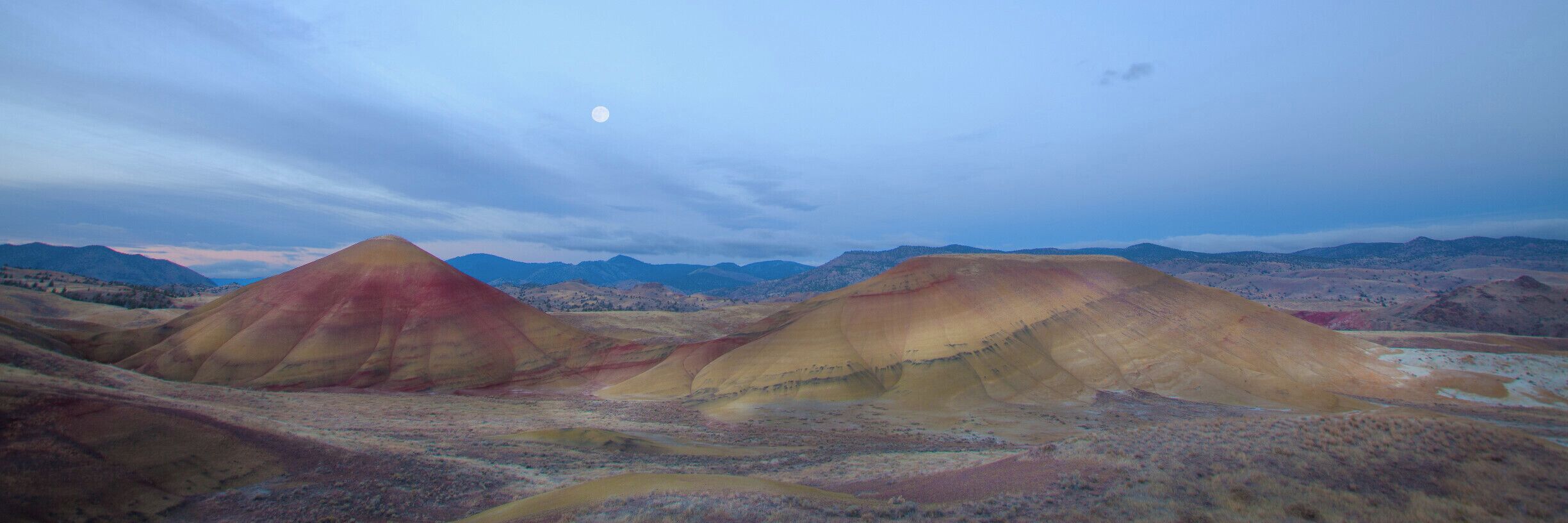Sunrise and full moon from the Painted Hills overlook. Most iconic shots of the Painted Hills are 180 degrees from this view. I always encourage you to look 360 degrees and plan accordingly. 