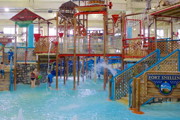 A water park with various play structures and water features.