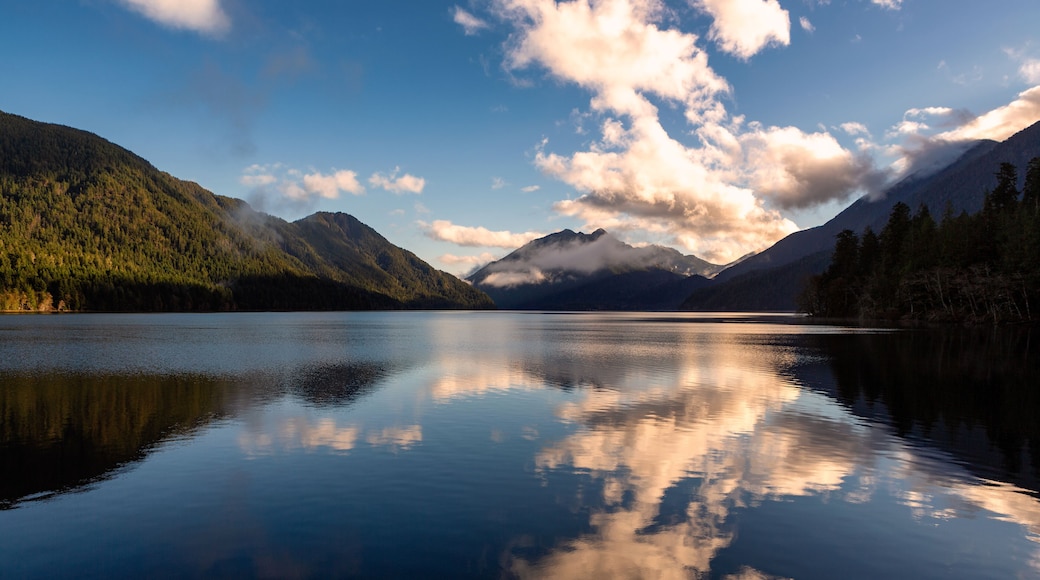 Clouds and Mountains reflect off a lake in Olympic National Park, Washington