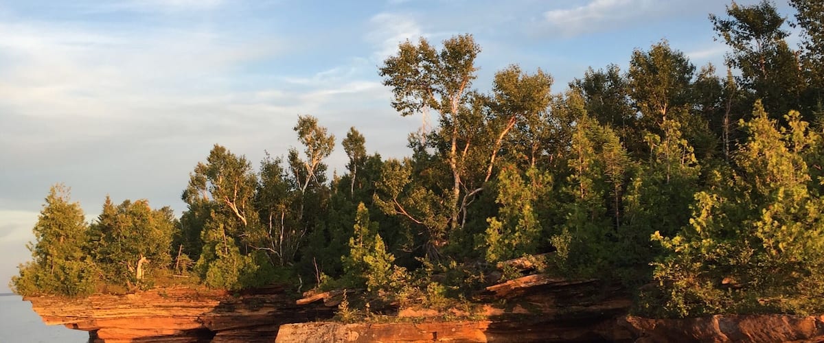 Sea caves on Devil's Island as seen from the Grand Tour sunset cruise.