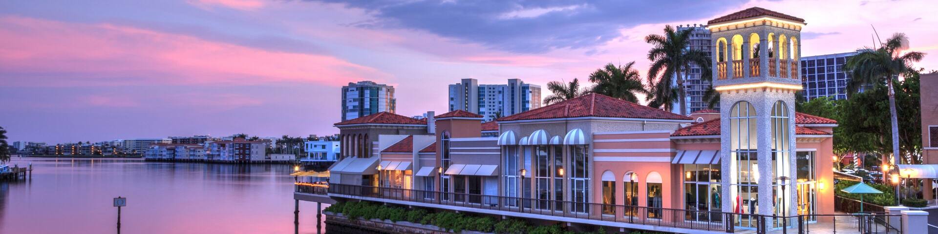 Pink Sunset over the colorful shops of the Village on Venetian Bay in Naples, Florida, Shutterstock ID 1134823487, Purchase Order: Wave 0 First Batch, Order Number: , Client/Licensee: Hotels.com / BEX