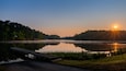 Sunrise on Lake Gaston sunburst and reflection on the water