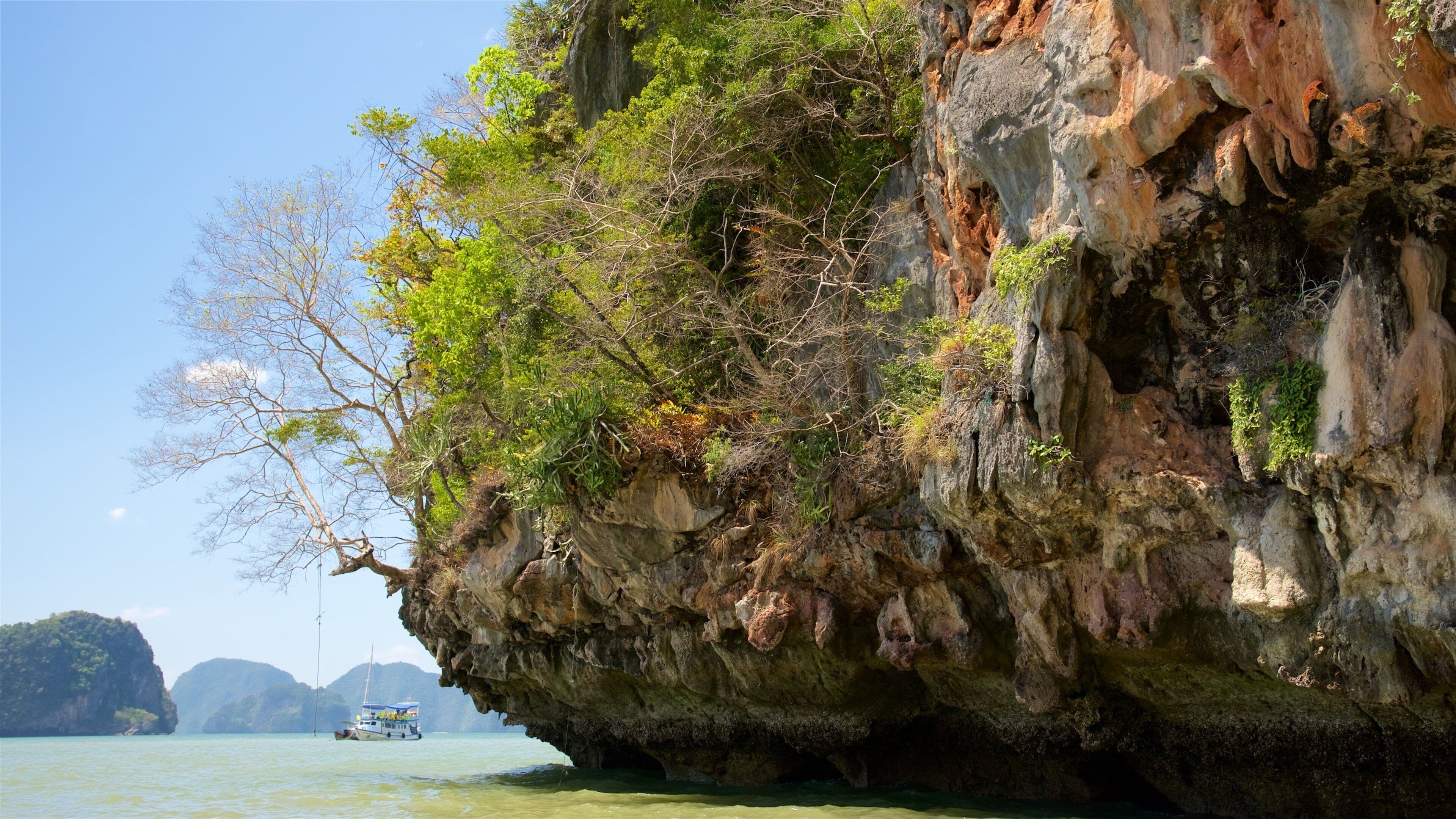 Khao Phing Kan featuring general coastal views and rugged coastline