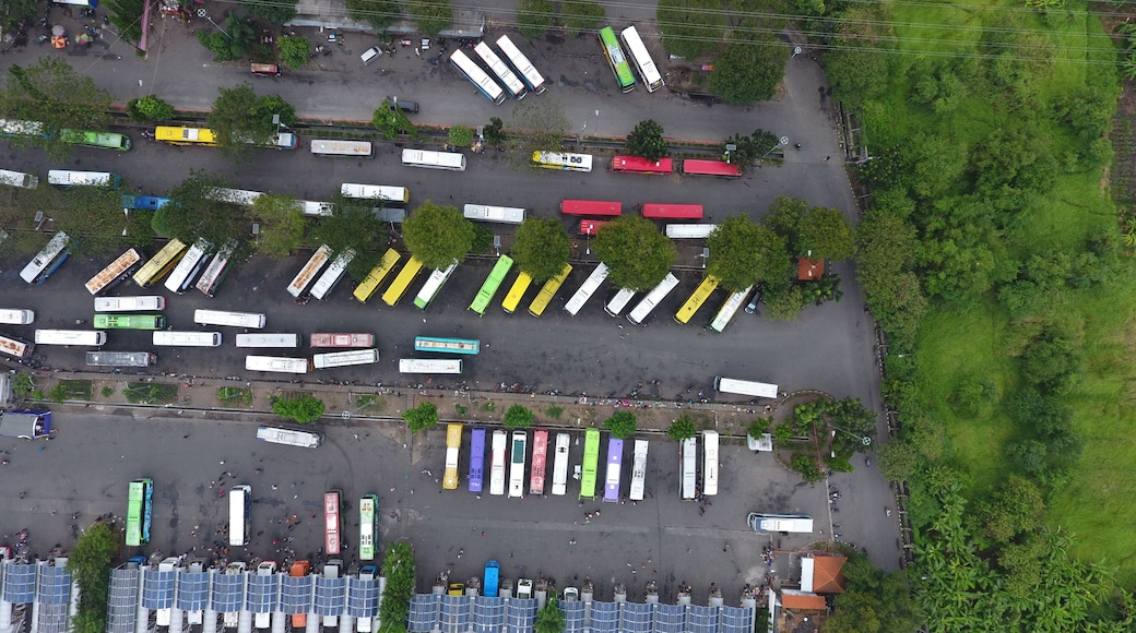 Aerial view of bus parking in the Purabaya Bus Terminal area, Sidoarjo, East Java, Indonesia