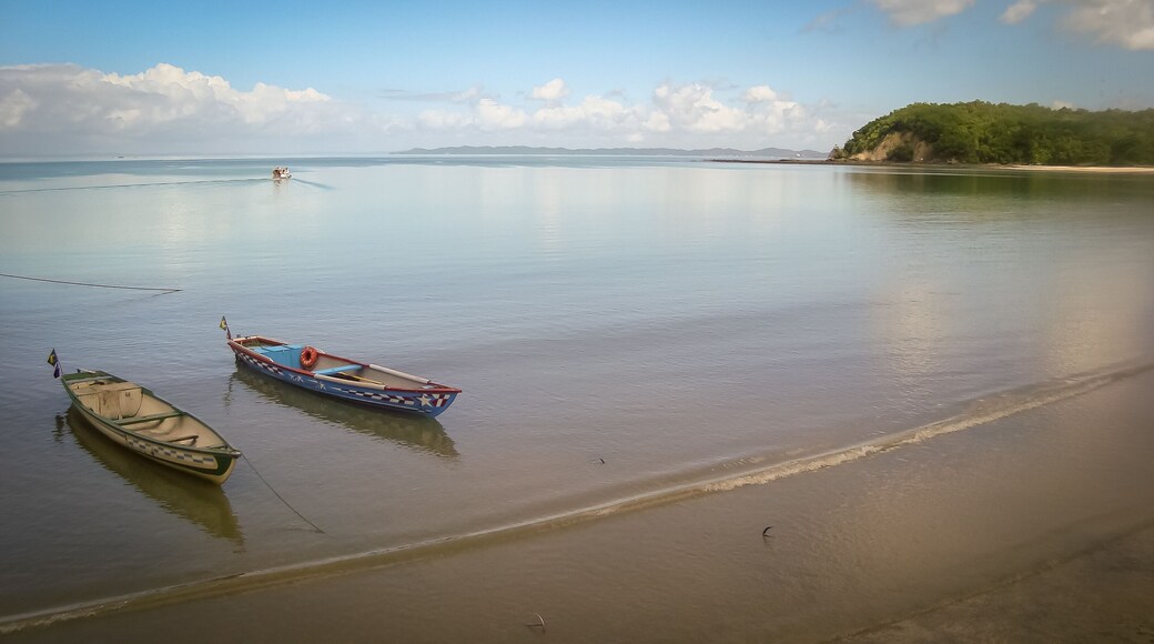 Amazing landscape, isolated boat in the sea, in Ilha de Mare, Salvador, Brazil