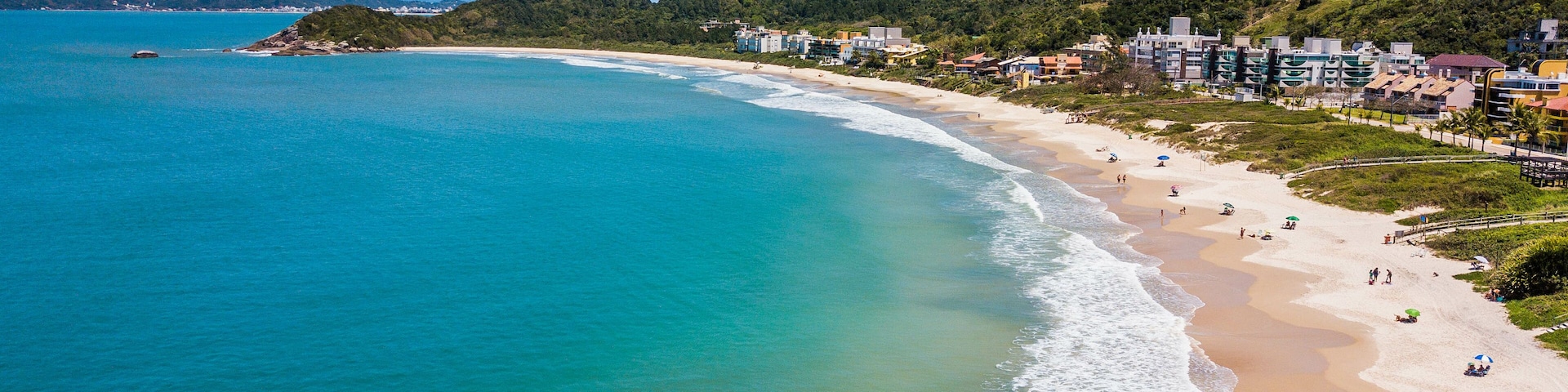 Bombinhas - SC - Brazil. View to Quatro Ilhas beach. Aerial panoramic view touristic beach of Bombinhas - Brazil