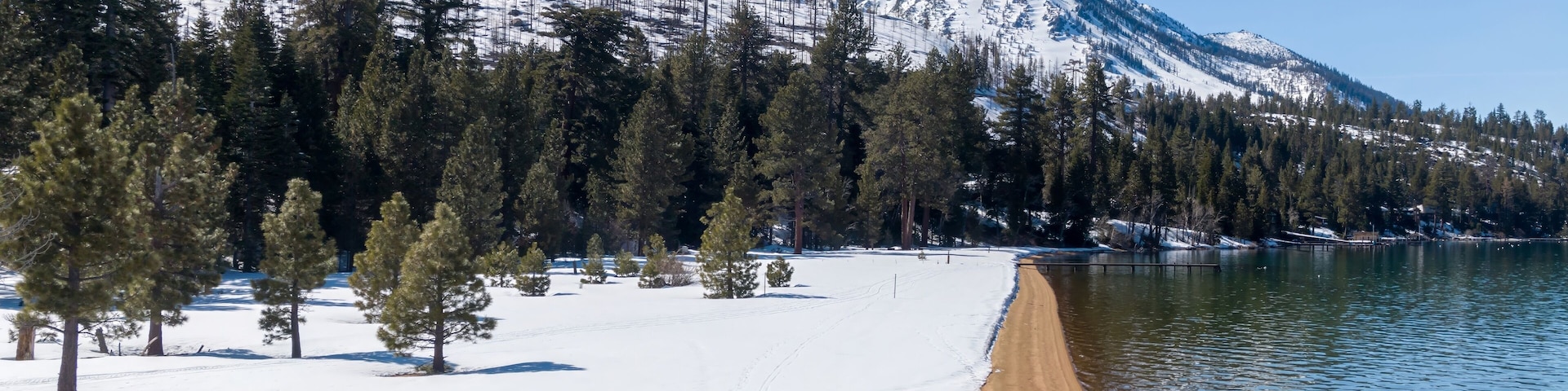 Baldwin Beach and snow on ground on Lake Tahoe. Cascade, South Lake Tahoe, California, United States of America.