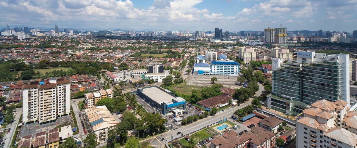 High rise view from top of city of Malaysia, blue sky, Selangor, Petaling Jaya, Kelana Jaya, UNITAR, Proton.