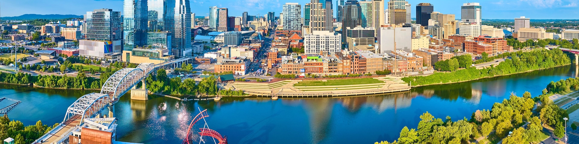 Aerial Panorama of Nashville Skyline with Pedestrian Bridge and Riverfront