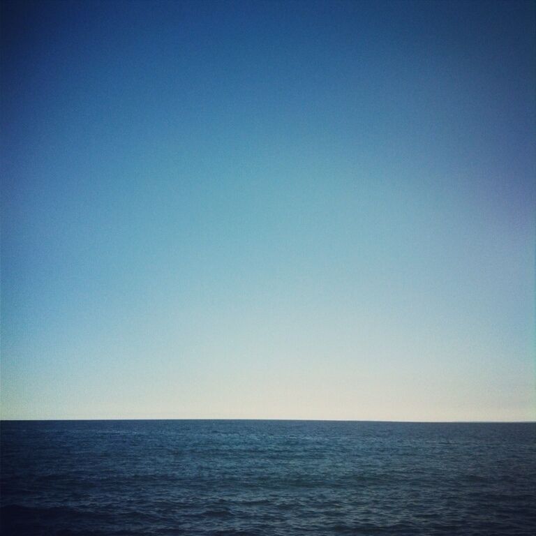 Lake Superior from the waterfront in Duluth, Minnesota. Seagulls and peaceful waves. The largest lake in the world is like a fresh water ocean. July 27, 2012