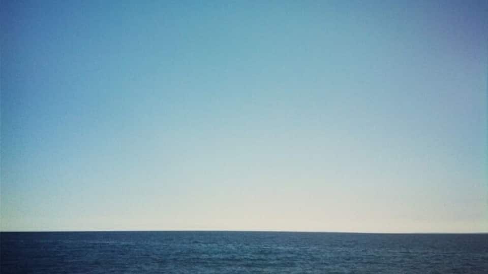 Lake Superior from the waterfront in Duluth, Minnesota. Seagulls and peaceful waves. The largest lake in the world is like a fresh water ocean. July 27, 2012