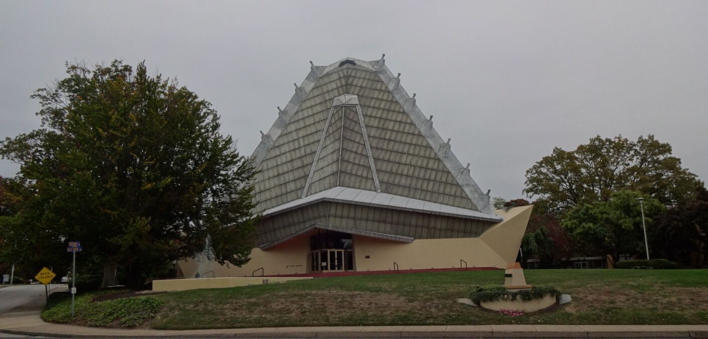 Is this a greenhouse with a tumor? Nope, it is the Beth Sholom (House of Peace) synagogue, the only synagogue designed by architect Frank Lloyd Wright. The building was completed and consecrated in 1959. During the day, the interior is lit by natural light entering through the translucent walls overhead. At night, the entire building glows from interior artificial lighting.