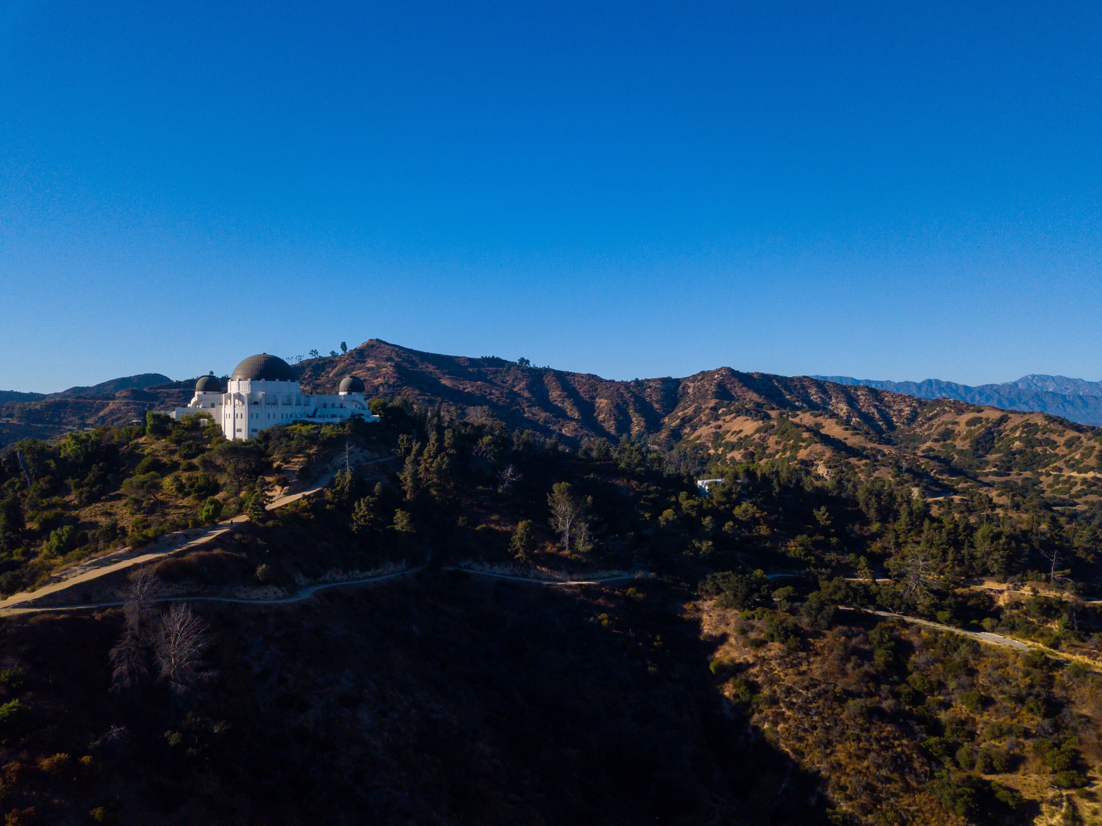 Aerial views of Griffith Park Observatory in Griffith Park, Los Angeles, California.
