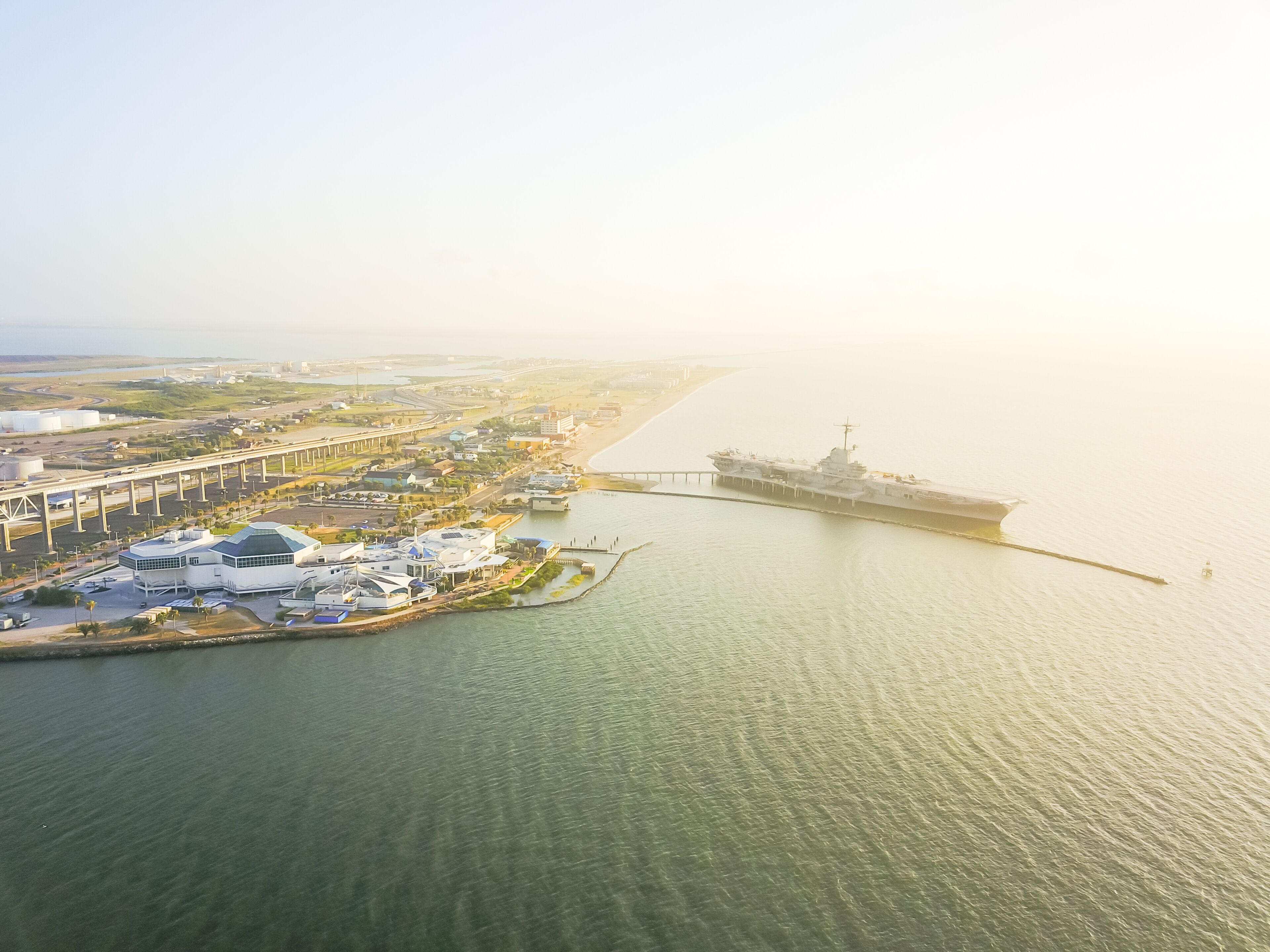 Aerial view North Beach in Corpus Christi, Texas, USA with aircraft carrier ship