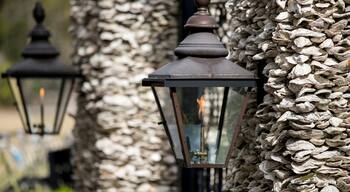 Architectural detail of gas lamps on oyster shell wall in South Carolina.