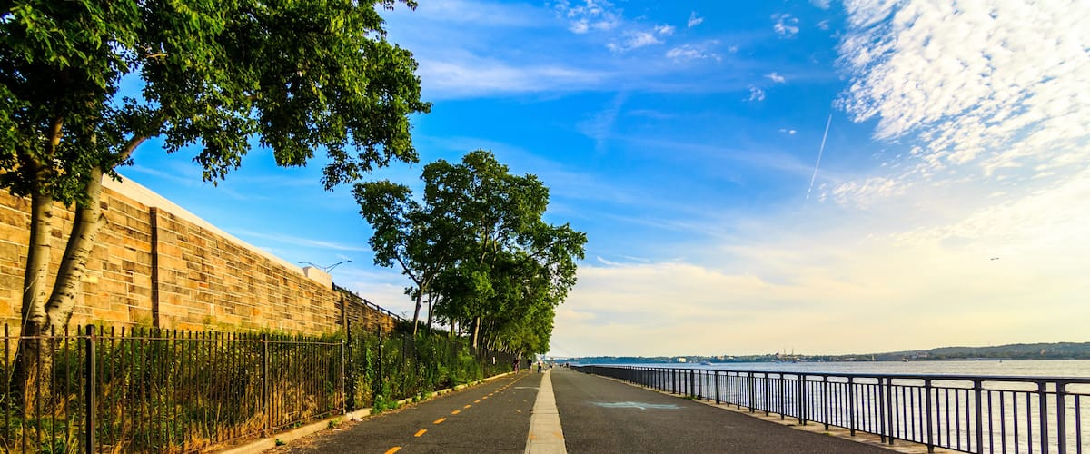 BROOKLYN, NY - 8/10/2017: Midday at Belt Parkway in Bay Ridge with the view of the Belt Parkway and Staten Island in the background.
