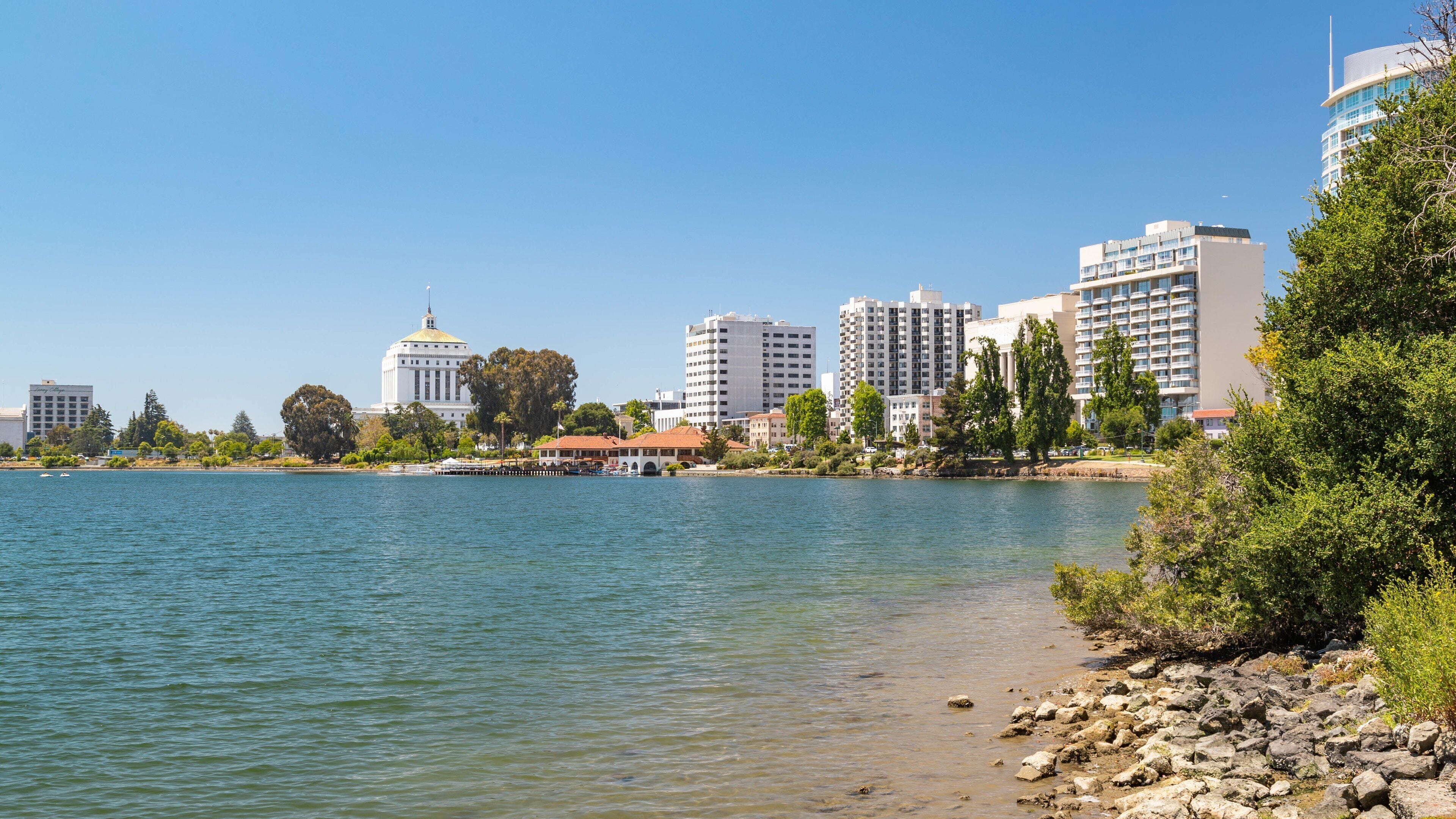 Lake Merritt featuring a coastal town and general coastal views