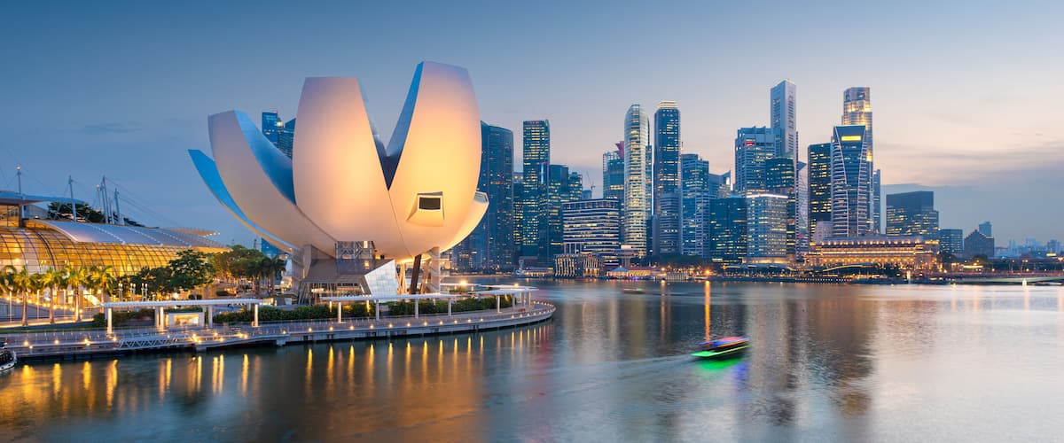 Singapore skyline at the Marina during twilight.