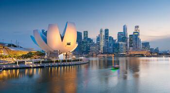 Singapore skyline at the Marina during twilight.