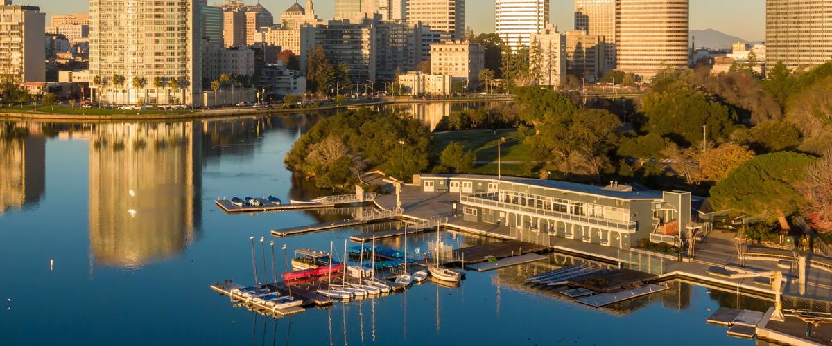 Lake Merritt Boating Center in Oakland, California, USA, offers recreational activities. People enjoy sailing, rowing, and paddling on the lake, promoting fitness and community engagement.
