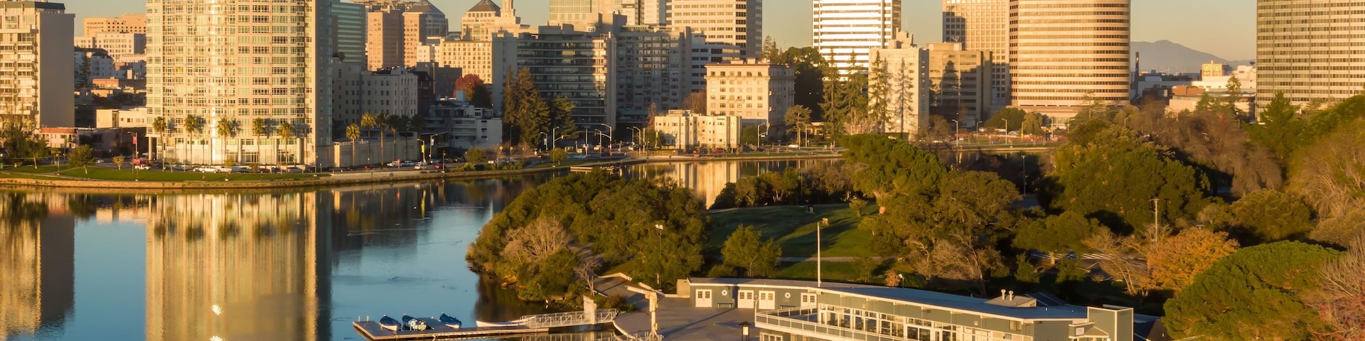 Lake Merritt Boating Center in Oakland, California, USA, offers recreational activities. People enjoy sailing, rowing, and paddling on the lake, promoting fitness and community engagement.