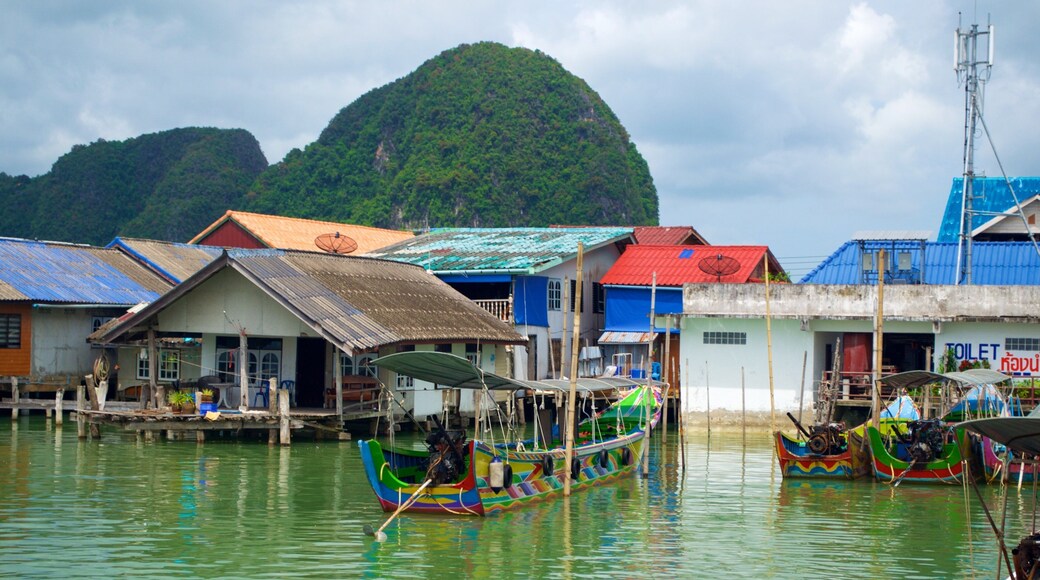 Ko Panyi featuring boating and a coastal town