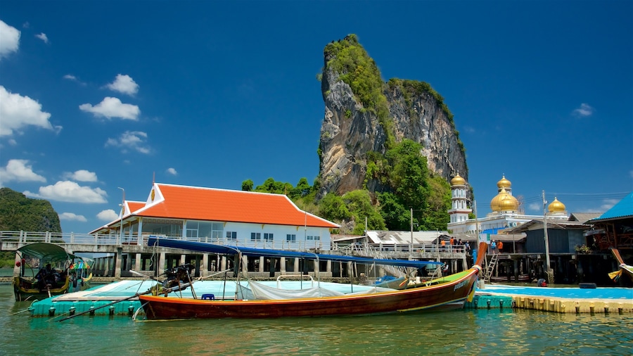 Phang Nga which includes rugged coastline, a coastal town and a bay or harbour
