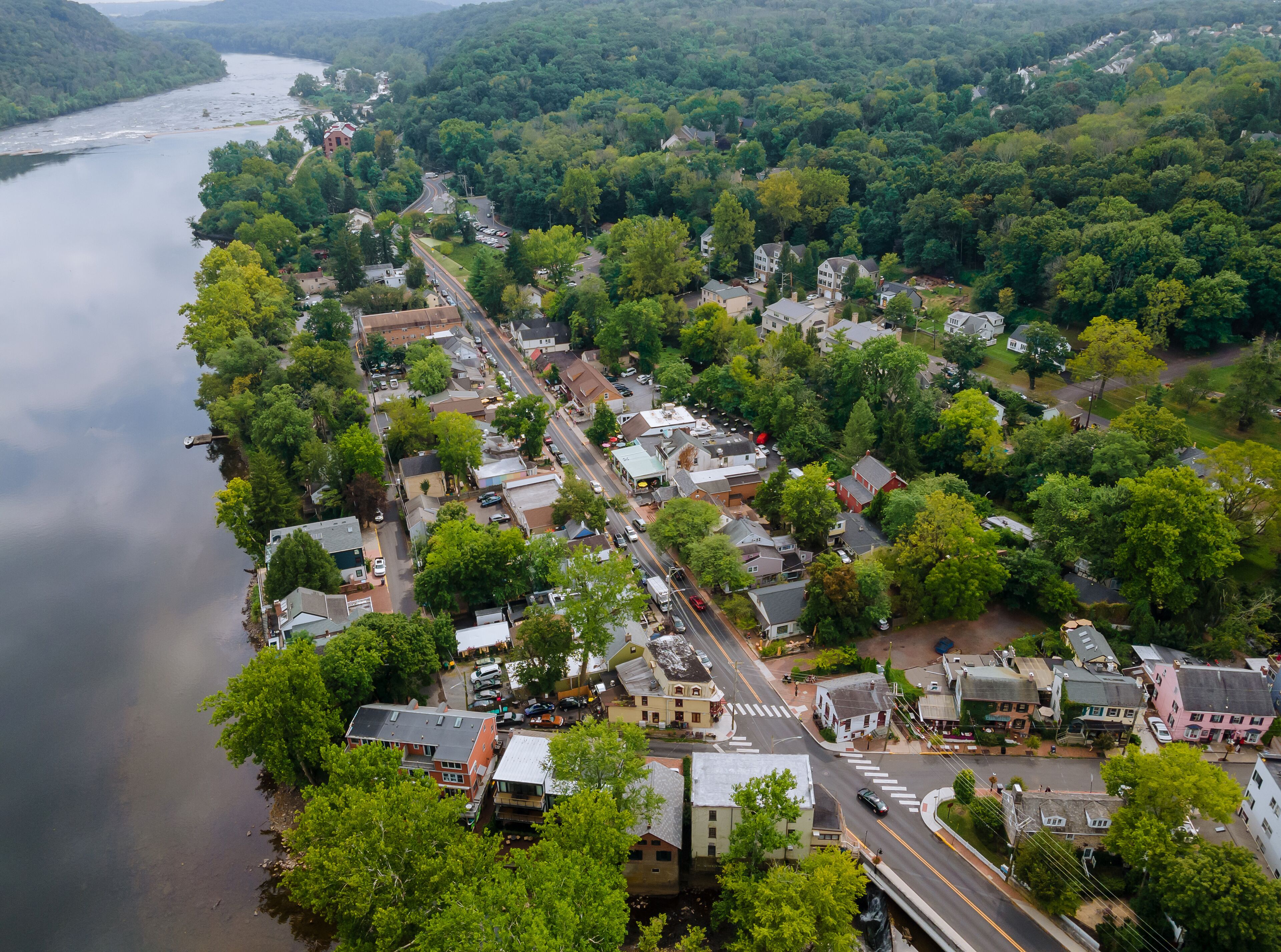 Overhead view of Delaware river aerial landscape of small town Lambertville New Jersey with historic city New Hope Pennsylvania USA