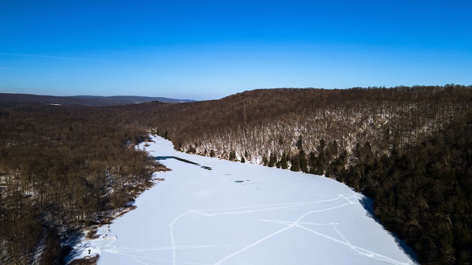 Aerial Snow Laurel Hill Lake Area Seven Springs