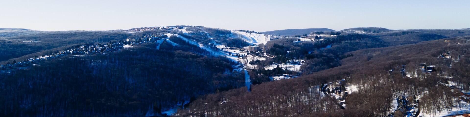 Aerial Snow Laurel Hill Lake Area Seven Springs
